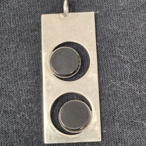 Sterling Silver Rectangle Pendant With Two Circular Black Stones